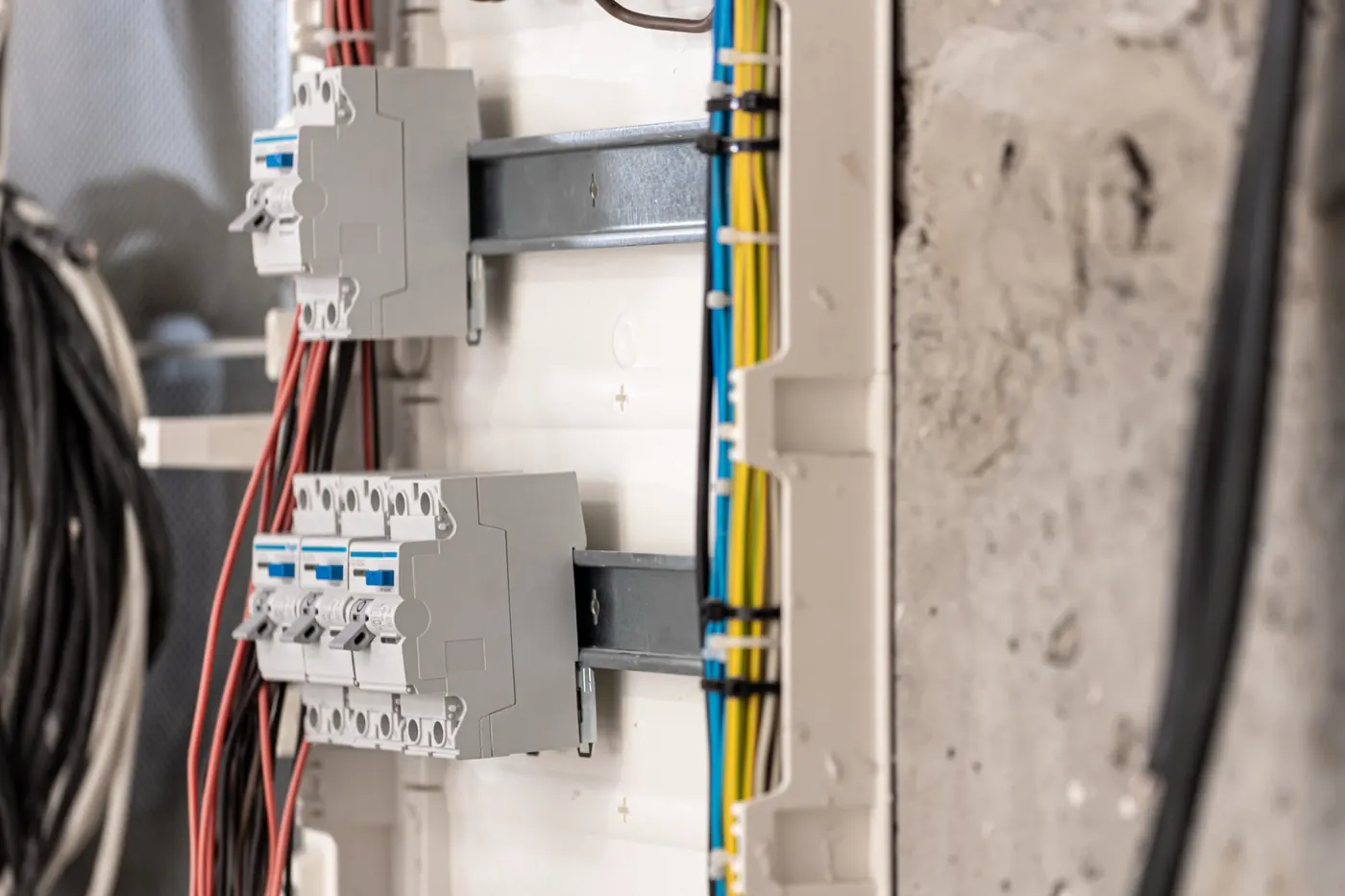 Close-up of electrical breakers and connected wiring