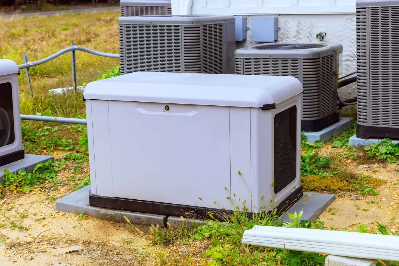 Enclosed standby generator outside a home