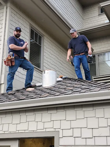 ZZ Electric team members working on a job site